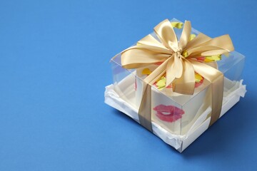 Colorful packaged cake on a colored background