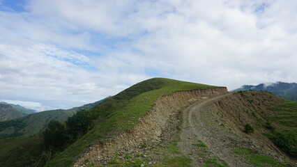The view of the road and mountain in Ollon Village, Toraja, South Sulawesi, Indonesia.