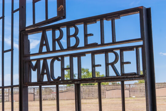 Iron Letters in a fence "arbeit macht frei" at the gate of the former Sachsenhausen concentration camp. Berlin, Germany 2 June 2009. 