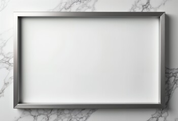 Obraz premium Elegant silver frame on marble wall with blank space for artwork or photographs