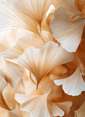 Close-up of ginkgo leaves, with light brown and white colors, layered paper art style