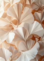 Close-up of ginkgo leaves, with light brown and white colors, layered paper art style