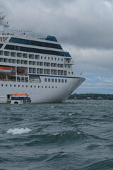 Small luxury cruiseship cruise ship liner Nautica anchoring at sea in bay of Newport, Rhode Island...