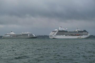Small luxury cruiseship cruise ship liner Nautica anchoring at sea in bay of Newport, Rhode Island...