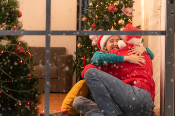 Couples give each other gifts on a snowy Christmas night