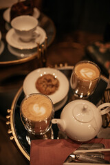 chinese tea ceremony and cappuccino