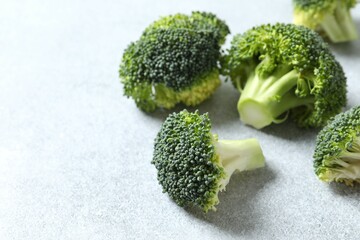 Fresh green broccoli on light background