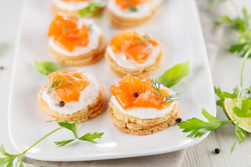 bread toast with cream and salmon. Buffet food, festive food, health food