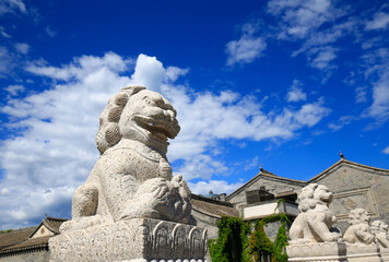 The stone lion on the ancient bridge