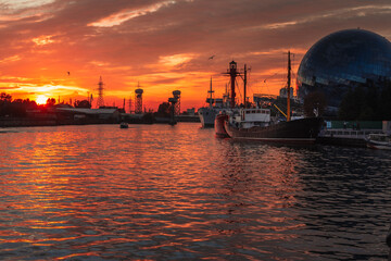 Pregolya River and ships in Kaliningrad at sunset. Russia