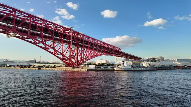 Osaka, Japan; 11 10 2024: Red bridge , Minato Bridge in Osaka.the symbol of Osaka Harbor