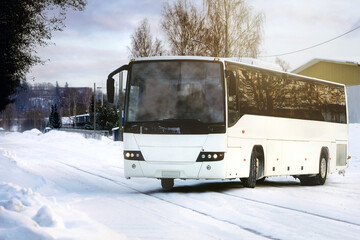 White Bus Travels in Winter Golden Hour