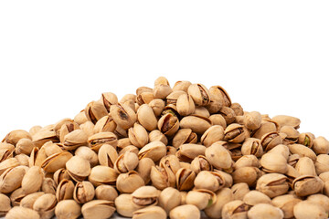 Tasty pistachios isolated on a white background.