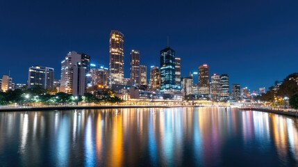 Obraz premium Nighttime Cityscape Reflection Over River Waters