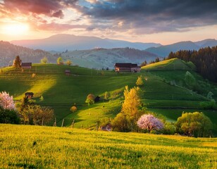 Obraz premium Beautiful autumn landscape with mountains at sunset. Yellow trees on green mountain hills illuminated with sunshine. Fall natural background.