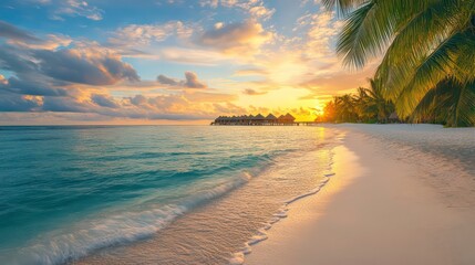 A serene beach sunset with gentle waves and palm trees lining the shore.