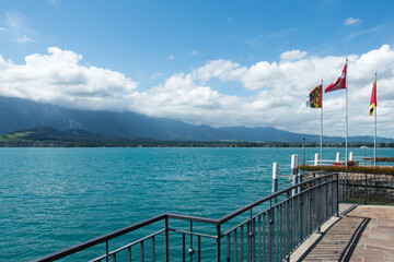 View of the lake Thun, Switzerland seen from the walking path between the village of Oberhofen and the city of Thun.