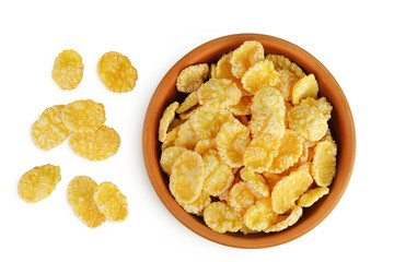 Cornflakes in ceramic bowl isolated on white background. Top view. Flat lay