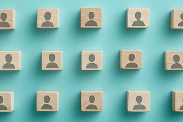 Obraz premium Teamwork Wooden Blocks with People Icons in a Symmetrical Pattern.