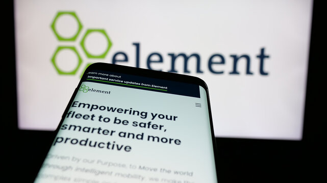Stuttgart, Germany - 10-28-2024: Mobile phone with website of Canadian company Element Fleet Management Corp. on screen in front of logo. Focus on top-left of phone display.