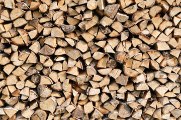 Neatly stacked stack of firewood, firewood for the fireplace, firewood, raw materials, wood rental,...