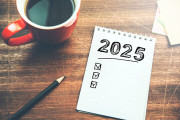 New year resolutions 2025 on desk. 2025 goals list
