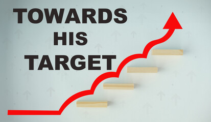 moves upward towards his target against the background of an upward arrow. Career growth or startup.