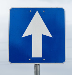 Blue Traffic Sign with Straight Forward Arrow