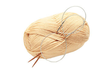 Beige knitting yarns and needles isolated on white background.