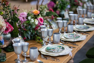 Romantic Outdoor Banquet with Floral Canopy and Chandeliers