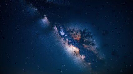 Fototapeta premium A stunning, vibrant image of the Milky Way galaxy, showcasing its swirling arms of gas and dust against a deep blue night sky