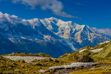 Mont Blanc, Monte Bianco mountain summit snow dome above the Chamonix valley in France. Highest peak in Europe in the Alps, alpice scenic view of Montblanc