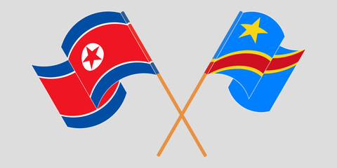 Crossed and waving flags of North Korea and Democratic Republic of the Congo. Vector illustration