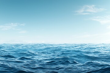 Fototapeta premium Serene ocean view showcasing gentle waves under a clear blue sky, perfect for tranquil landscape designs and calming visuals.