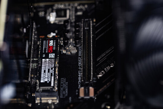 Samsung SSD 990 PRO PCle 4.0 NVMe M.2 on motherboard background