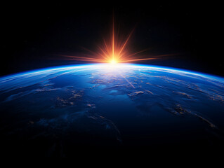 Obraz premium A stunning image of the Earth with sunlight peeking over the horizon from space, symbolizing hope and new beginnings.