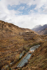 Cloudy sky over mountain range landscape