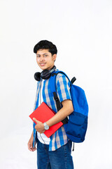Young Male Study Abroad Concept with Bag, Books and headphone gives expression and gestures Student