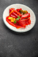 Baked pepper vegetable bell pepper tasty food snack dish fresh gourmet food background on the table rustic food copy space top view keto and paleo diet Vegetarian and vegan food