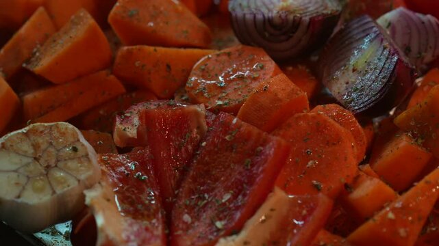 Baked pumpkin in the oven.
Baked vegetables close-up.
Pumpkin recipe.
Seasonal food.
Fried pumpkin and carrots.
Baked botata in the oven.
Carrot, bota, pumpkin, garlic, onion, pepper