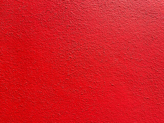 Red Textured Plaster Stone Wall Background with Rough Finish