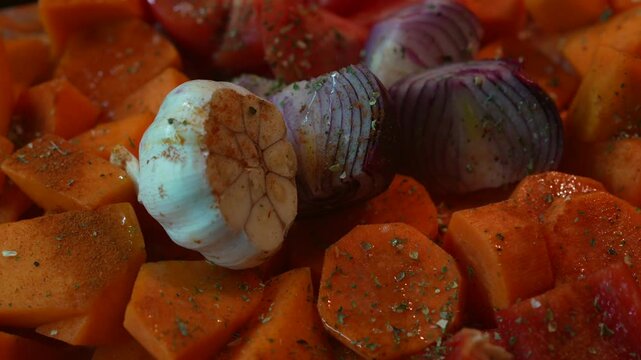 Baked pumpkin in the oven.
Baked vegetables close-up.
Pumpkin recipe.
Seasonal food.
Fried pumpkin and carrots.
Baked botata in the oven.
Carrot, bota, pumpkin, garlic, onion, pepper