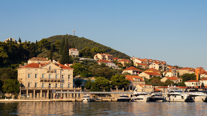 A captivating view of traditional houses in Dubrovnik, situated close to the coastline