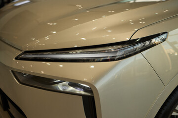 Close up of a cars headlight, part of automotive design