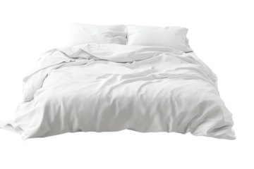 A cozy, inviting white bed with rumpled bedding, perfect for a serene bedroom atmosphere.