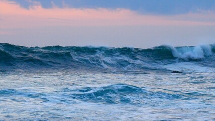 Tropical sea beach in summer time Purple sky on sunny day. Golden sand beach sea peaceful scenery on the beach. Travel vacation seaside outdoor. Ocean island beautiful dramatic Magenta landscape
