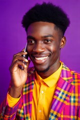 Studio photo: African American man talking on the phone