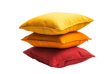 Three vibrant decorative cushions in yellow, orange, and red stacked together, adding a pop of color to any living space.