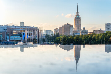 Obraz premium View of Berezhkovskaya Embankment in Moscow with reflection on a mirror stone surface