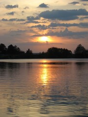 Naklejka premium sunset on the river